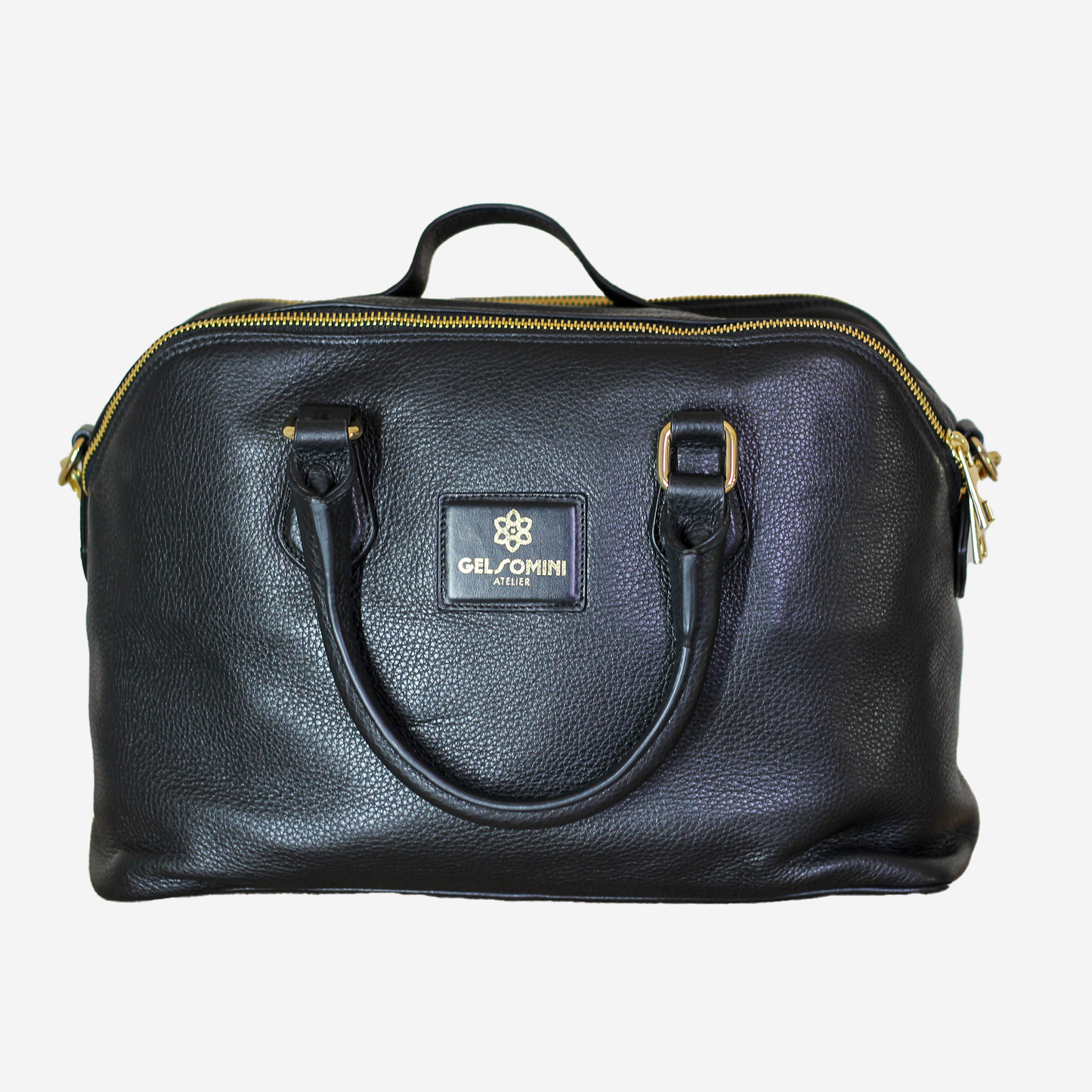ROME - Handcrafted leather bag with double compartment and removable shoulder strap.
