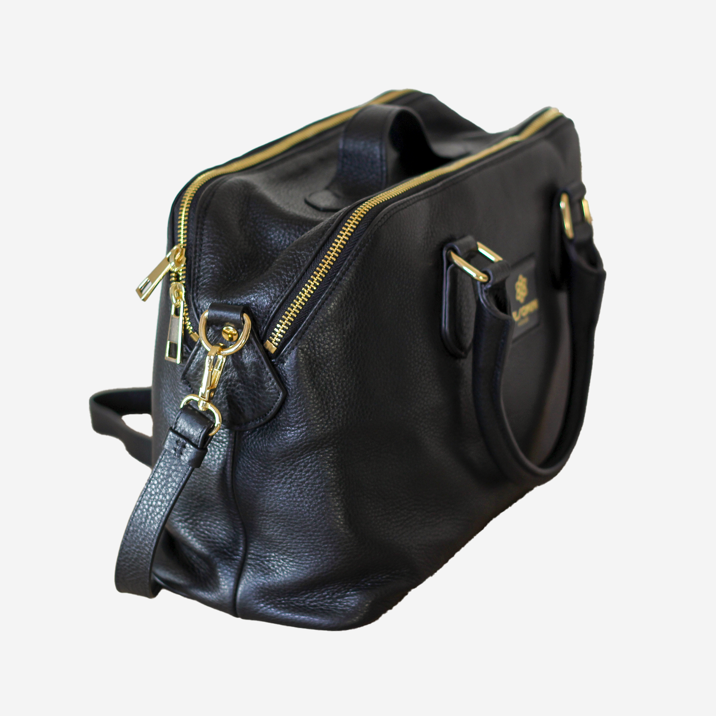ROME - Handcrafted leather bag with double compartment and removable shoulder strap.